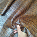 Cuero Grabado de Cocodrilo Marrón Oscuro – Lujo artesanal y presencia atemporal